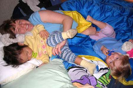 Another pile o' girls in the bed in the back of the RV
